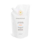 INNERSENSE natural color radiance daily conditioner bottle shows hydrated hair with color protection.