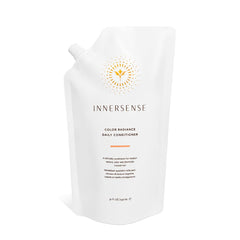 INNERSENSE natural color radiance daily conditioner bottle shows hydrated hair with color protection.