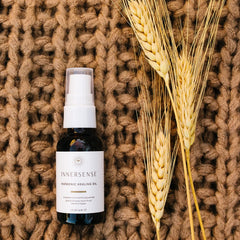 INNERSENSE Natural Harmonic Treatment Oil packaging highlights ethical sourcing and clean beauty.