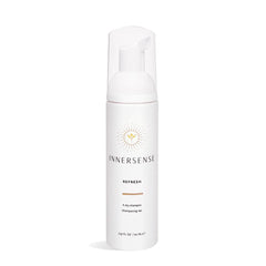 INNERSENSE Natural Refresh Dry Shampoo bottle soaks up oil for refreshed, voluminous second-day hair.