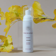 INNERSENSE Natural Refresh Dry Shampoo packaging highlights clean, cruelty-free, gluten-free formulation.