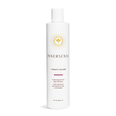 INNERSENSE I Create Volume lotion bottle close-up, showcasing fuller roots and added body.