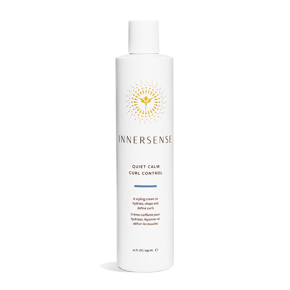INNERSENSE Quiet Calm Curl Control bottle reduces frizz for defined curls.