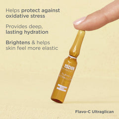Application motion of ISDIN Flavo-C Ultraglican serum on face.