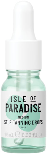 Isle of Paradise self-tanning drops bottle being poured for easy mixing with moisturizer.