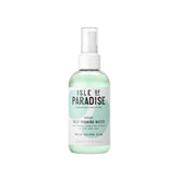 Isle of Paradise Self-Tanning Water application on face and body for even glow.