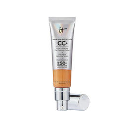 IT Cosmetics CC+ Cream Tan bottle with SPF 50+ protection on skin.