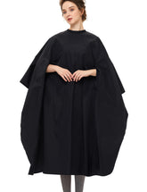 Izzycka barber cape with armholes showing hands-free design for precise grooming.