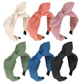 Jaciya wide knotted bow headband in daily wear context for a polished look