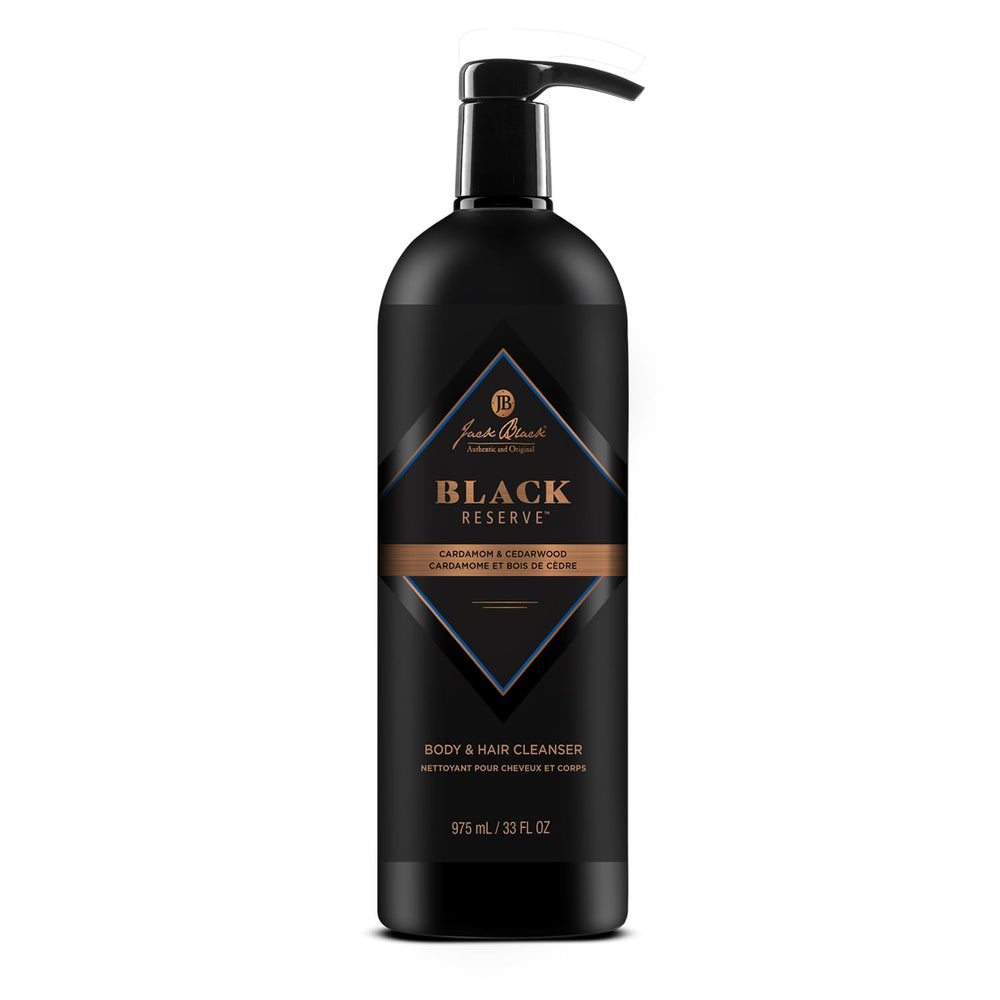 Jack Black Black Reserve Cleanser bottle pour showing cardamom-cedarwood aroma for balanced cleansing.