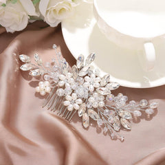 Jakawin pearl-flower rhinestone detailing on the silver comb for subtle shine in updos.