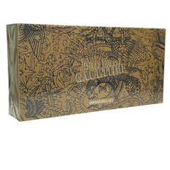 Jean Paul Gaultier miniature bottles arranged for elegant display and travel-friendly scents.