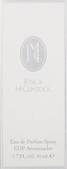 Jessica McClintock cap closeup, showcasing luxe bottle design and timeless femininity.