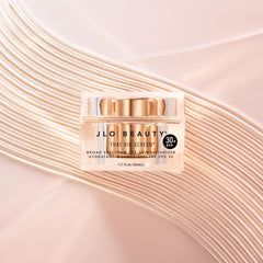 JLO Beauty SPF 30 application on hand demonstrates quick daily protection.