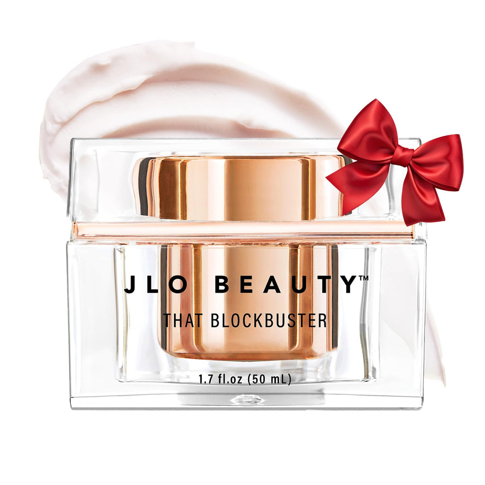 JLO BEAUTY That Blockbuster moisturizer bottle close-up shows silky hydration potential.