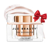 JLO BEAUTY That Blockbuster moisturizer bottle close-up shows silky hydration potential.