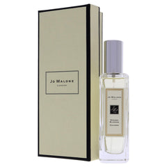 Jo Malone Orange Blossom spritz on wrists for daytime scent diffusion.