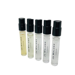 Jo Malone set of five vials close-up, showcasing mini fragrances for testing before a bigger purchase.