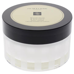 Jo Malone Wood Sage & Sea Salt Body Crème cream swirl on skin for hydration.