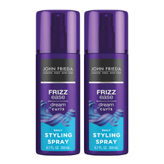 John Frieda Dream Curls daily styling spray bottle closeup showing frizz control for defined curls