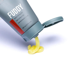 JOHNNY B. Fuddy hair-model shot shows natural matte finish across styles