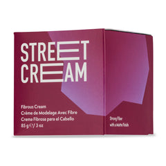 Johnny B. Street Hair Cream bottle closeup showing matte hold for textured styles.