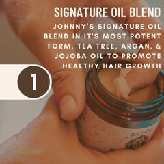 Johnny Slicks hands applying pomade shows easy melt and distribute for versatile hold.