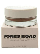Jones Road What The Foundation bottle pour demonstrates easy, buildable coverage for a natural complexion.