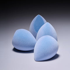 Close-up of JUNO & Co. microfiber fibers highlighting ultra-soft texture for gentle makeup pickup.