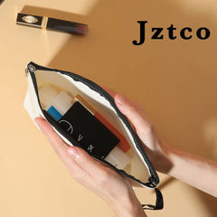Jztco Dorothy ruby red makeup bag printed quote highlighting encouragement and charm.