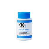K18 Damage Shield bottle demonstrating daily hair protection and shine