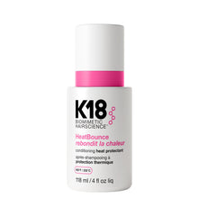 K18 HeatBounce bottle demonstrates lightweight leave-in protection and detangling.