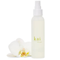 Kai Body Glow bottle close-up showing dry oil spray for radiant, hydrated skin.