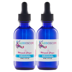 Kaleidoscope Miracle Drops bottle pour showing a cooling scalp oil for refreshed feel.