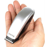 KEMEI Mini Clippers packaging highlights compact travel-ready grooming kit.