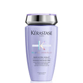 KÉRASTASE Blond Absolu Bain Ultra-Violet shampoo bottle highlights blue-violet pigments for cool tones.