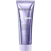Kérastase Blond Absolu Cicaflash bottle highlights hydrating, color-safe conditioner for damaged blonde hair.