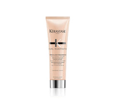 Kerastase Curl Manifesto Creme de Jour bottle pour for instant frizz control