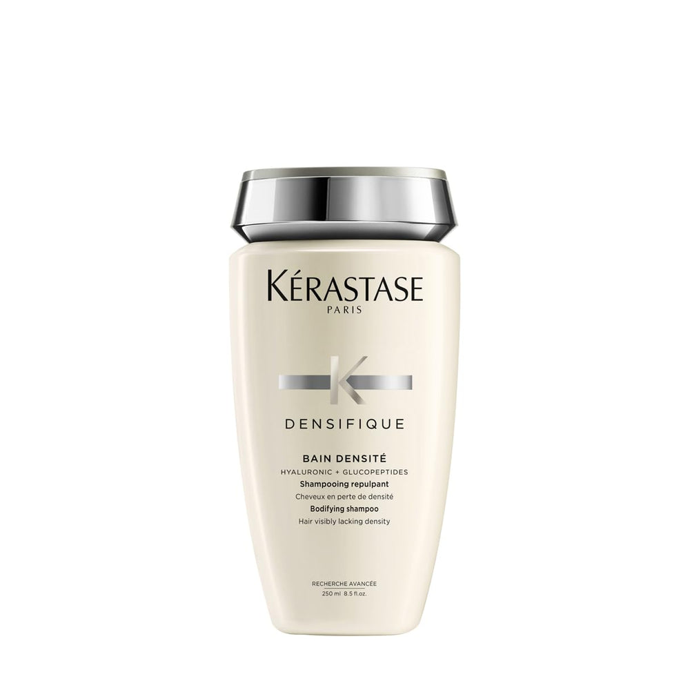 KÉRASTASE Densifique shampoo bottle boosts fullness with gentle cleansing.