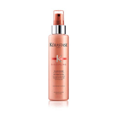 KÉRASTASE Discipline Fluidissime spray bottle showing frizz control and shine.