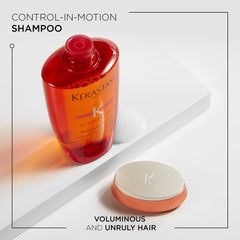 KÉRASTASE Discipline Oleo-Relax shampoo pump dispensing for easy application and smooth hair.