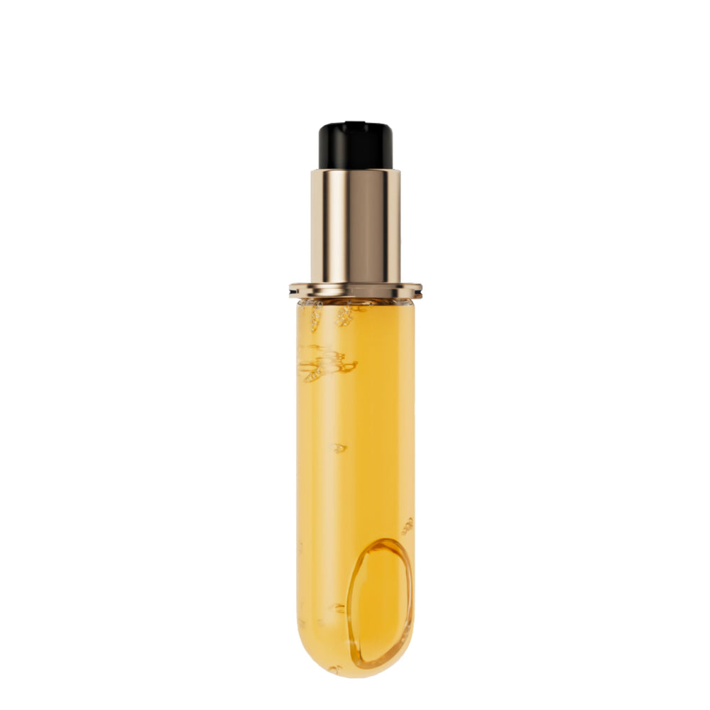 KÉRASTASE Elixir Ultime oil bottle demonstrates radiant shine on premium packaging.