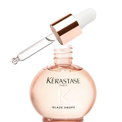 KÉRASTASE front packaging showing sleek bottle and brand benefit