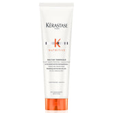 Kérastase Nectar Thermique bottle pour demonstrates heat protection for smooth styling.