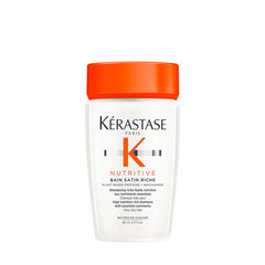 Kérastase Nutritive Bain Satin Riche bottle pouring rich shampoo for luxurious cleansing