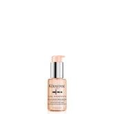 KÉRASTASE bottle front packaging showing product identity and compact travel size