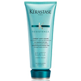 KÉRASTASE Resistance Ciment Anti-Usure packaging signals premium restorative care for damaged hair.