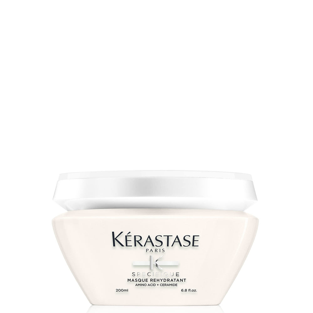 KÉRASTASE Specifique Rehydratant bottle shows weightless hydration for dry hair.
