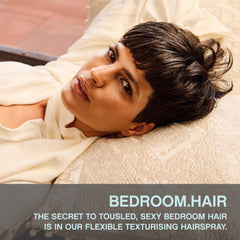 KEVIN.MURPHY BEDROOM.HAIR bottle in hands for easy on-the-go styling.