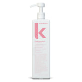 KEVIN.MURPHY PLUMPING.RINSE bottle closeup showing hydrating thickening formula